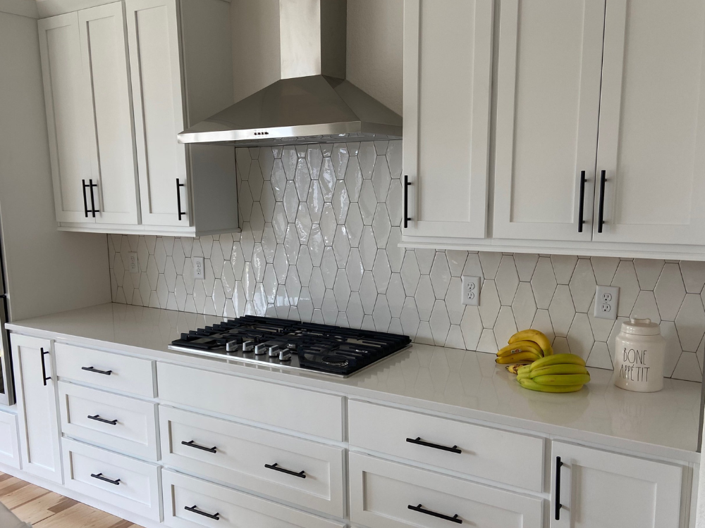 White custom backsplash in kitchen